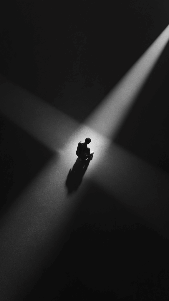 3D perspective from above looking down on a lone silhouette on its knees. Its hands are cupped, and a single, faint point of light in shape of a cross emanates from above them, the only illumination in the total darkness, symbolizing a fragile hope. Cinematic still, black and white photo, claustrophobic atmosphere, deep shadows.